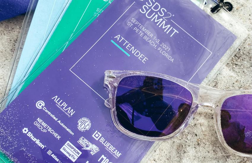SDS2 Summit nametags and sunglasses on the beach